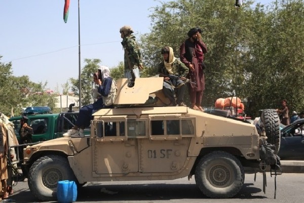 Taliban flag torn down in first signal of popular opposition