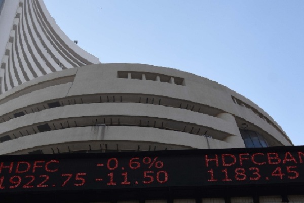 Equity markets close at record high levels; Sensex above 56K mark