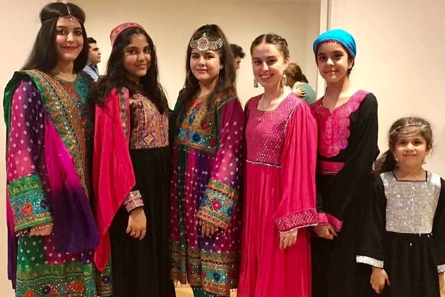 Afghan women protest Taliban's hijab diktat by sharing photos in colourful dresses