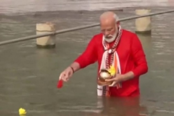 Modi takes holy dip in Ganga before inaugurating Kashi Vishwanath Corridor