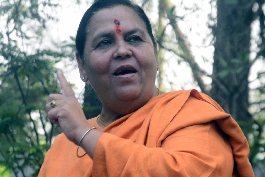 Uma Bharti vandalises liquor shop in Bhopal