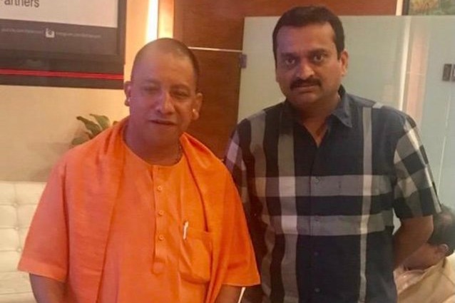 Bandla Ganesh calls on Yogi, wishes him for becoming UP CM for second time 