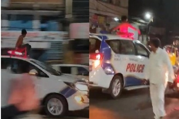 Drunk man hops on to moving police vehicle in Hyderabad