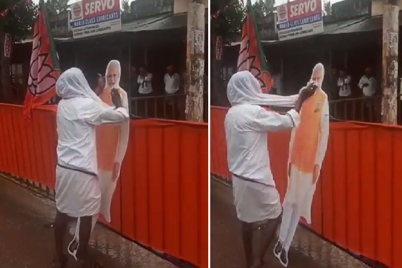 Video shows Karnataka farmer wiping PM's cutout; Shah terms it 'beautiful'