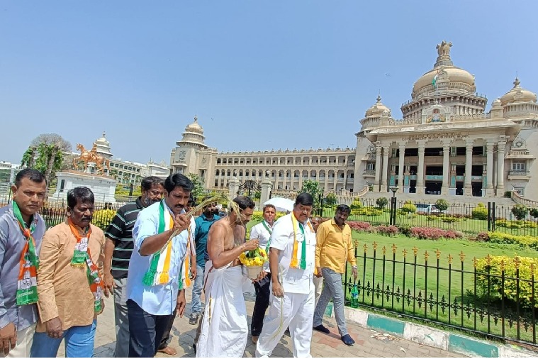 Congress workers purify Karnataka Vidhana Soudha with cow urine