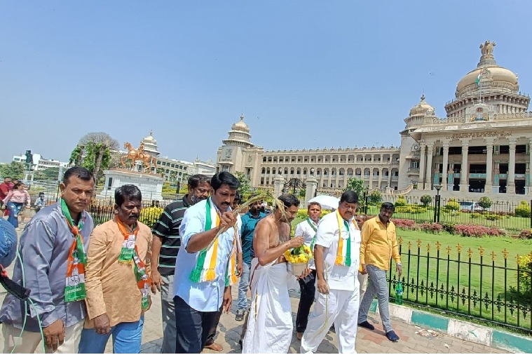 Congress workers purify Karnataka Vidhana Soudha with cow urine