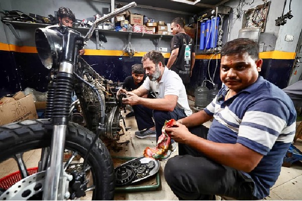 Rahul Gandhi interacts with bike mechanics in Delhi