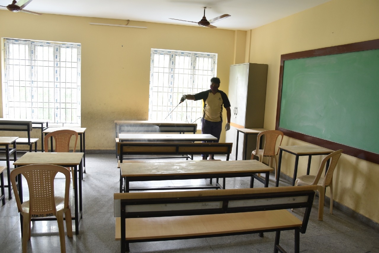 School headmaster suspended for sleeping naked in front of students