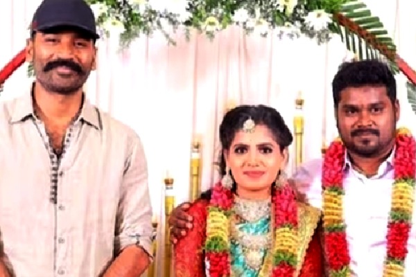 Dhanush sports casuals as he attends assistant's wedding