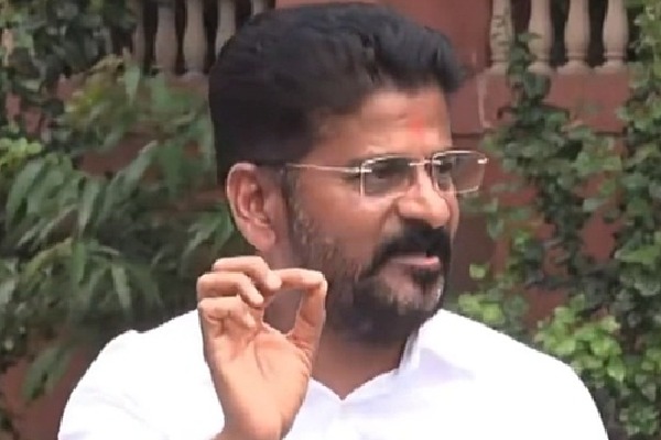 I-T raids sign of Congress tsunami in Telangana: Revanth Reddy