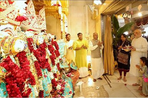 Amit Shah celebrates Uttarayan with temple visit, kite flying in Ahmedabad