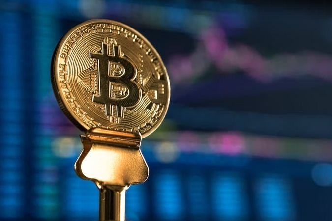 Bitcoin crosses $57,000 for first time since 2021