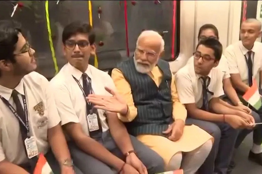 PM takes ride on India’s first underwater metro line in Kolkata with schoolchildren