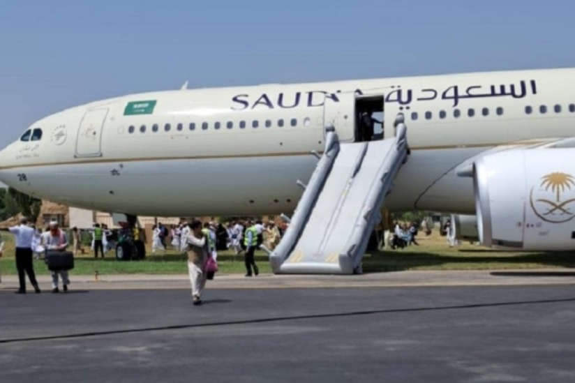 Plane catches fire on landing in Pakistan, passengers safe