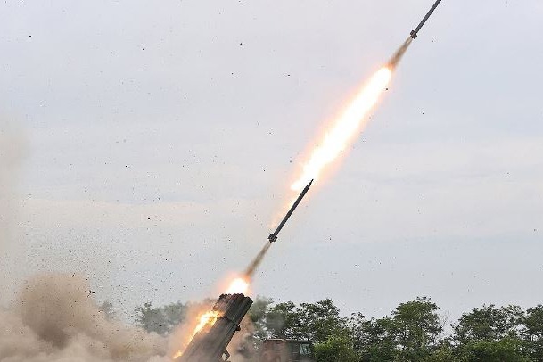 N.Korea test-fires multiple rocket launcher equipped with new guidance system