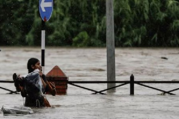 Nepal to aid bereaved families as flood death toll rises to 209