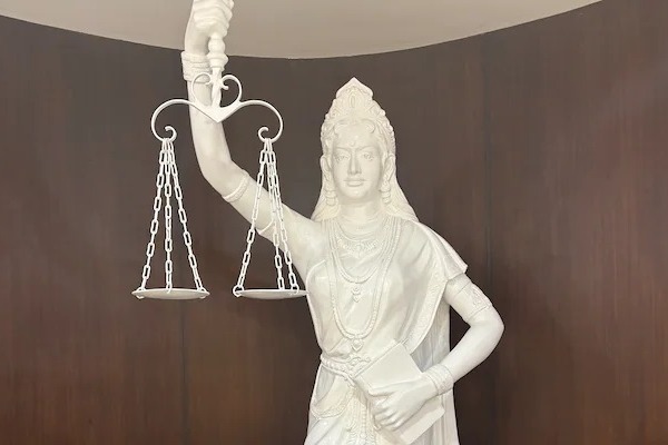 Lady Justice in SC library now holds a Constitution with open eyes