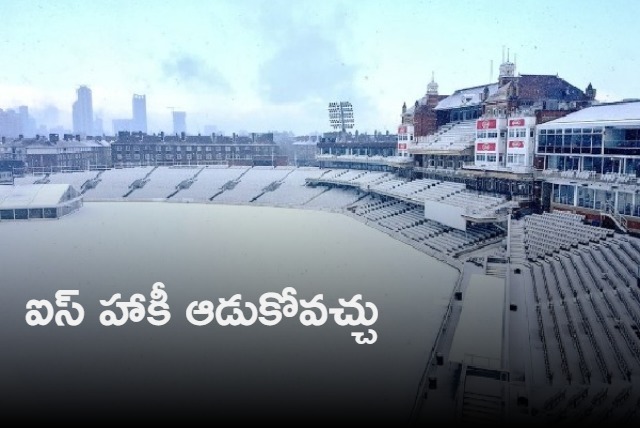 Oval cricket ground filled with snow