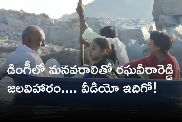 Raghuveera sails with his granddaughter in a coracle 