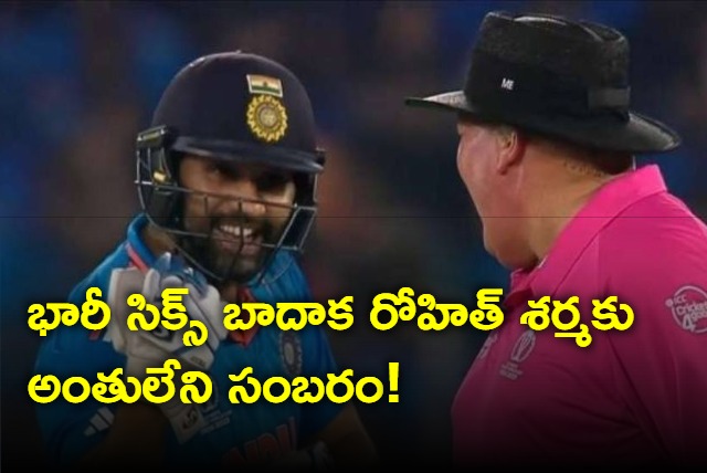 Rohit Sharma flexes his muscles to umpire Marais Erasmus after hitting 90m six off Haris Rauf