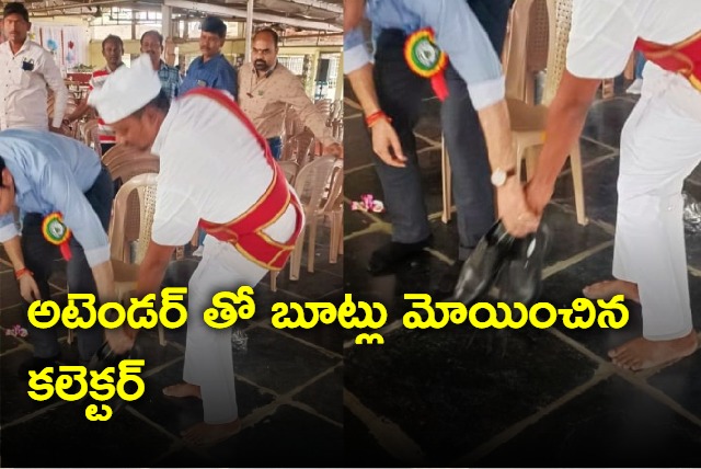 Jayashankar Bhupalpally Collector Bhavesh Mishra Carrying Shoes With An Attendant