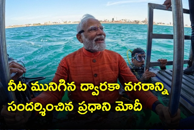 Modi visits Dwaraka city immersed in waters