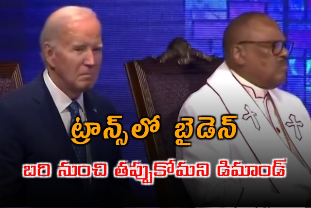 Joe Biden sits in a trance at church  